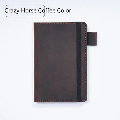 Handmade cowhide kraft notebook open showing wood-free paper, in dark green colour