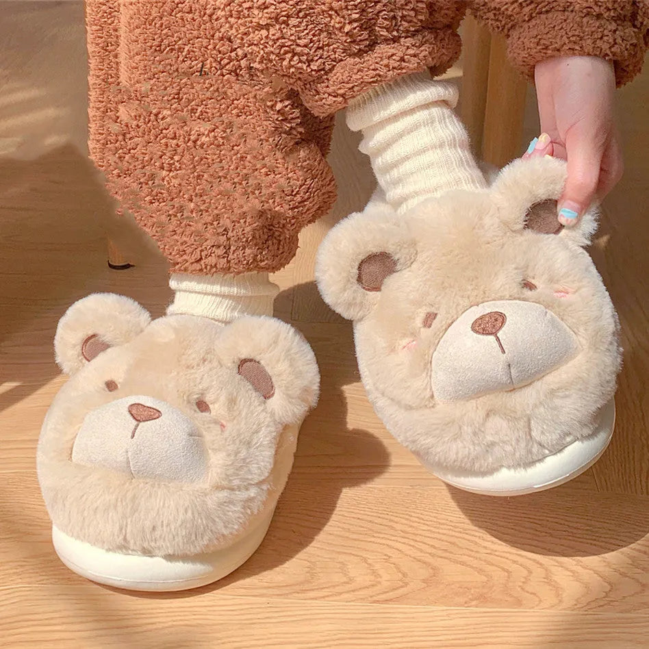Women's plush suede slippers in cartoon design showing round toe and available colour options