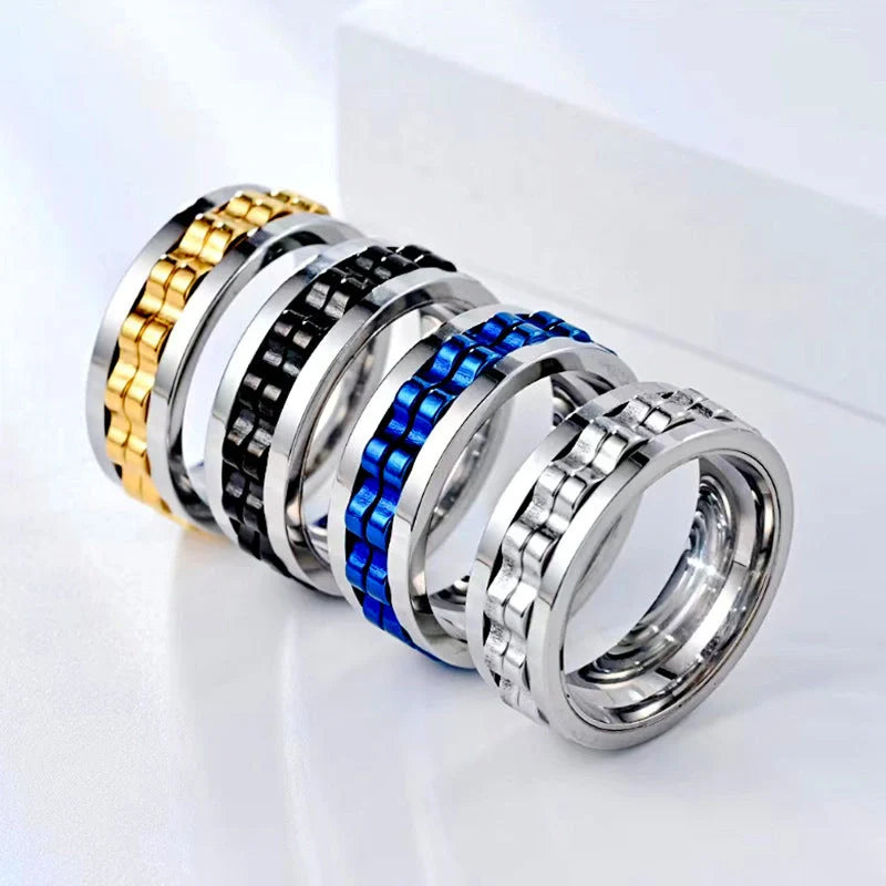 Men's titanium spinner ring with square texture and rotating gear in various colors