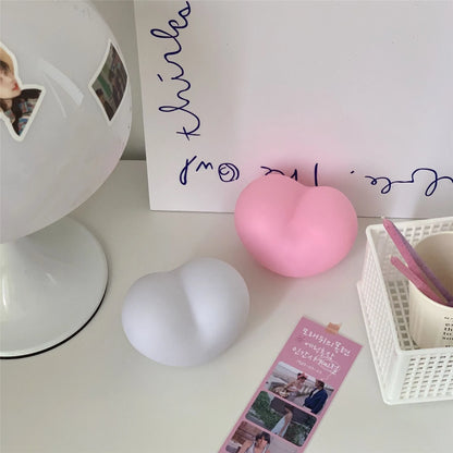 Vinyl atmosphere lamp in small or large size with warm glow, powered by batteries, available in white or pink colours