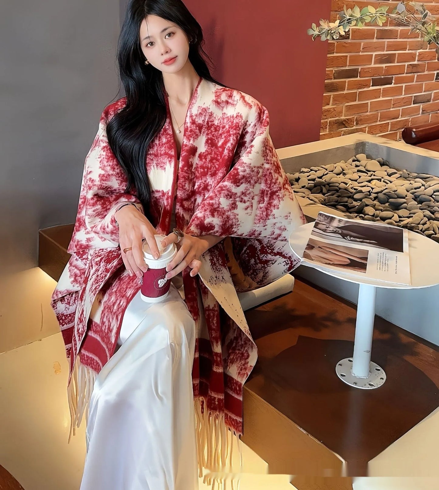 Women's polyester tassel scarf cape in free-size design showing 15 cm fringe detailing and shawl-style drape