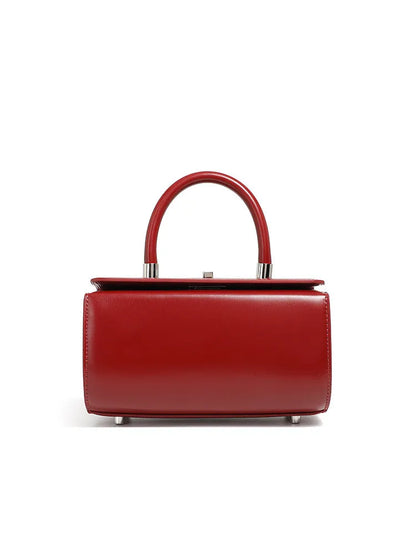 Genuine cowhide leather women's crossbody bag with clamshell opening and internal organisation compartments