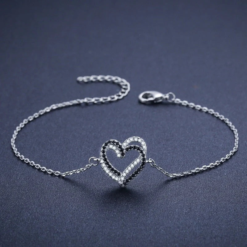 Black titanium steel heart bracelet for women, elegant and durable jewelry piece