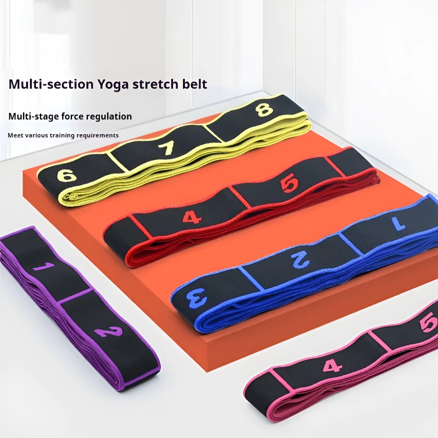 Blue multi-section yoga stretch strap for Pilates and dance exercises on a wooden floor