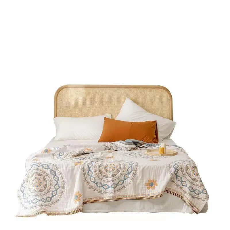 Cotton waffle weave blanket in a geometric pattern, measuring 180x200cm or 200x230cm, offering warmth and moisture-wicking properties for year-round use at home.