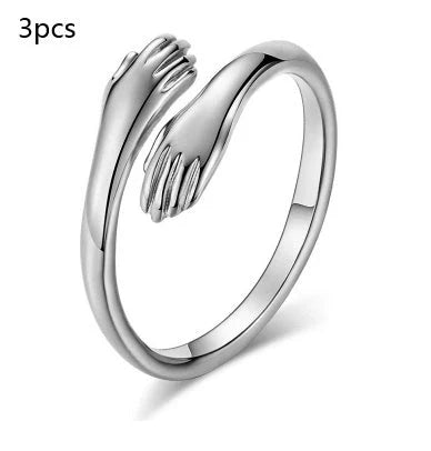 Adjustable Alloy Hands Hug Ring in gold and silver, featuring a unique geometry design