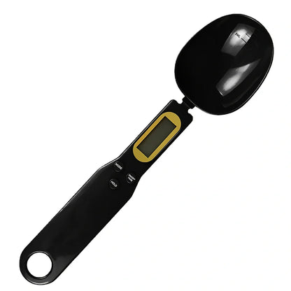 Digital kitchen spoon scale showing measurement display and USB charging port