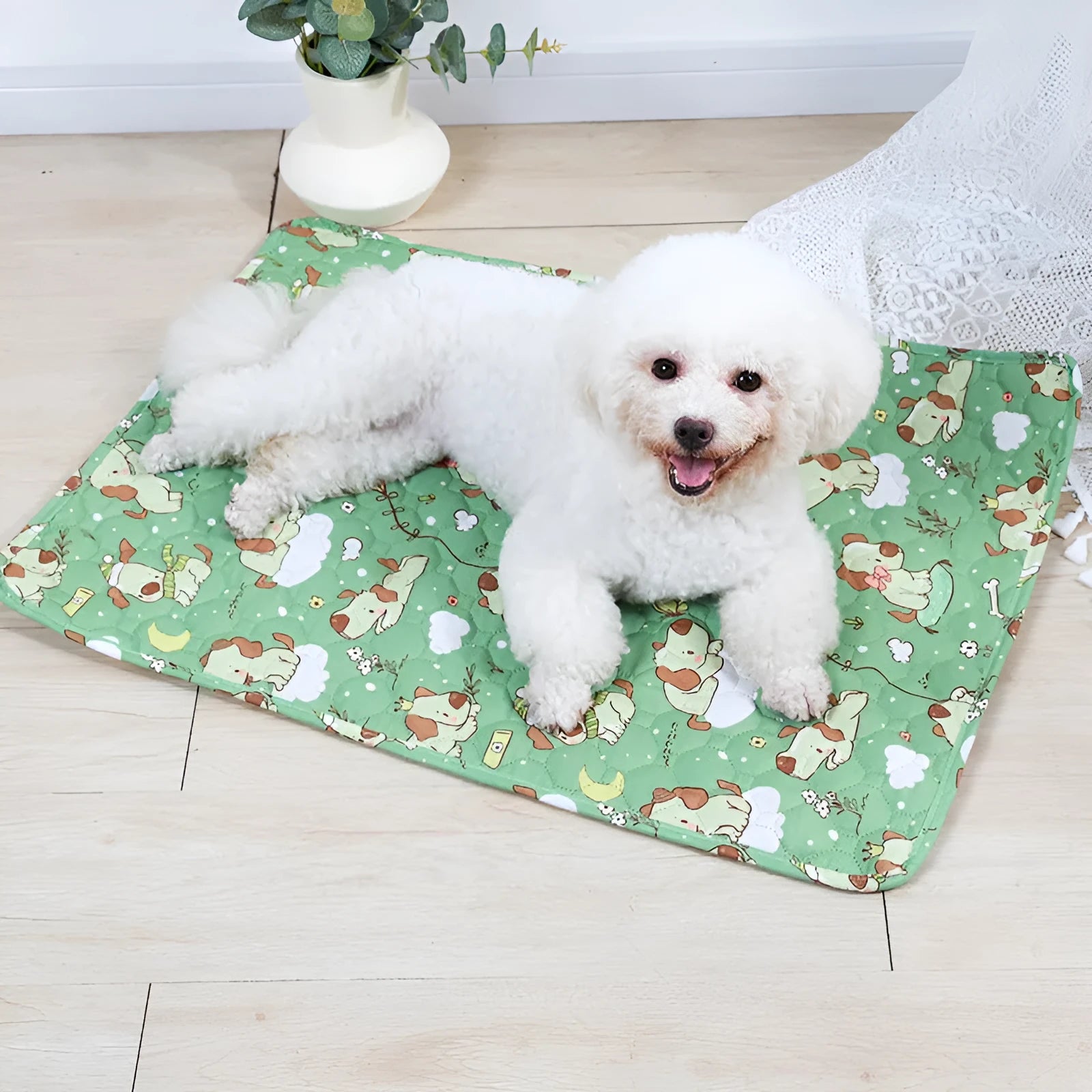 Reusable cloth pet urine pad with animal print and waterproof non-slip backing in various sizes.