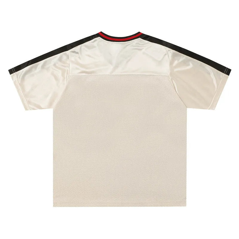 Apricot sports V-neck jersey top with drop-shoulder sleeves and letter pattern