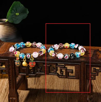 Handmade glass bracelet with 10mm swallowing gold beast cherry blossom heart charm in six colour options