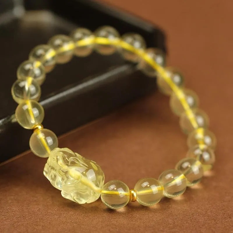 Yellow leather bracelet with citrine Pi Xiu charm and beads in selectable sizes.