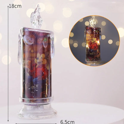 Transparent electronic Christmas candle showing house, snowman and bear designs, 18cm height