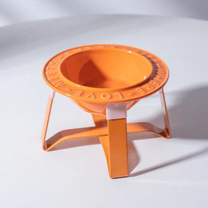 Ceramic cat bowl with iron anti-tip frame in blue colour with silicone pad