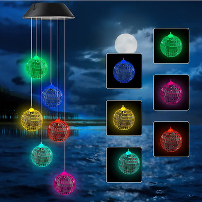 Solar-powered wind chime garden lamp with hummingbird design, automatic day-night operation, waterproof construction