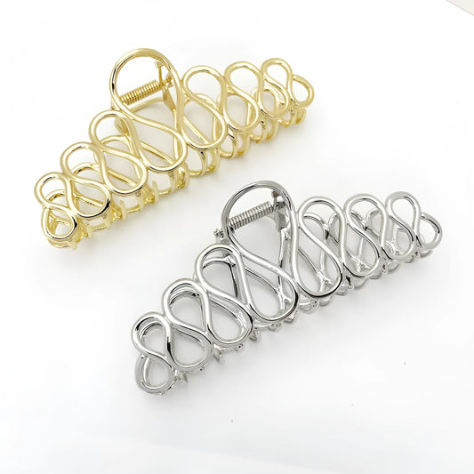 Large gold and silver minimalist hair clip with tassel detail for women's thick hair and updos.