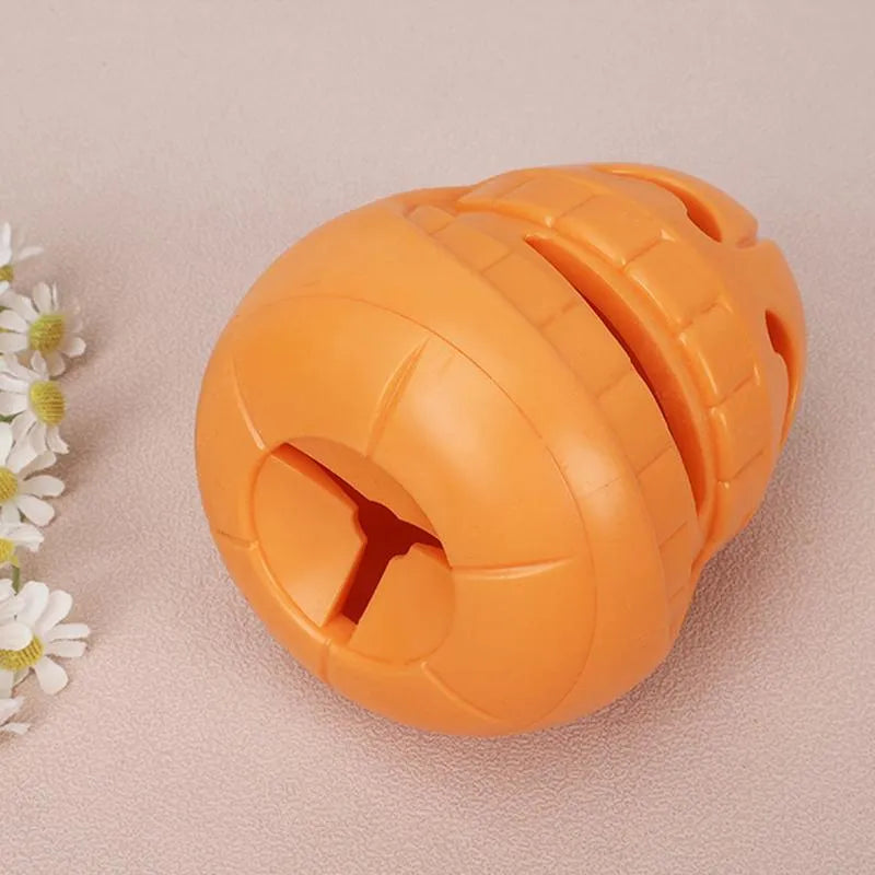 Yellow TPR pumpkin-shaped durable chew toy for aggressive dogs and teething puppies.