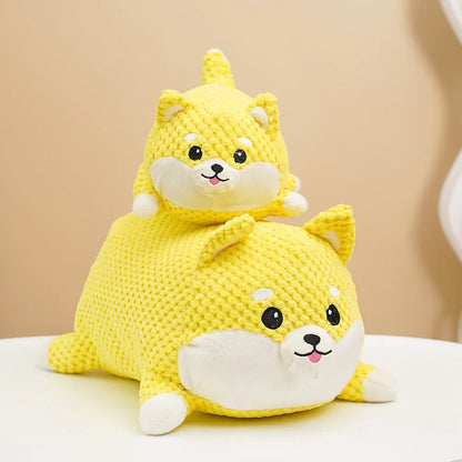 Calming plush dog toy with teeth cleaning chew surface and squeaker