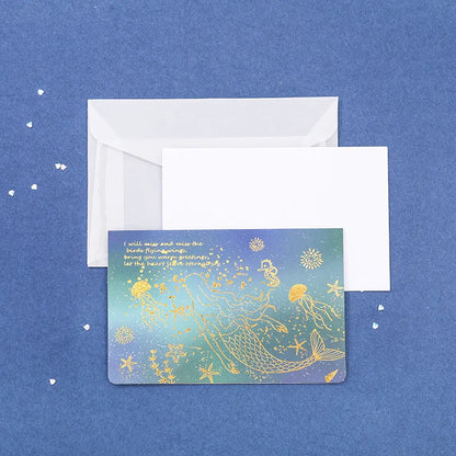 Set of three bronzing detail greeting card envelopes in cosmic colours, showing mermaid style fold.