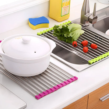 Black folding stainless steel sink drain rack with silicone edges, shown both unfolded for drying and folded for storage