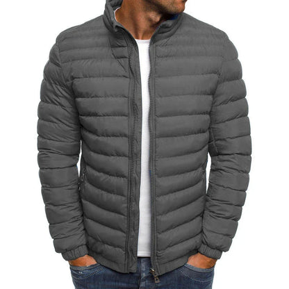 Warm padded winter jacket for men in various solid colors, featuring zippered pockets and a loose, comfortable fit for easy layering.