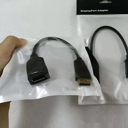 Black DisplayPort male to female extension cable approximately 10cm long with rotating connector