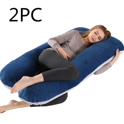Large U-shaped pregnancy support pillow with removable cover and abdominal support belt.