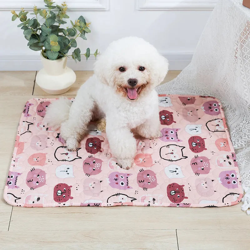 Reusable cloth pet urine pad with animal print and waterproof non-slip backing in various sizes.