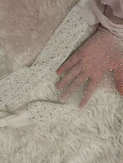 Women's fishnet stockings with a diamond mesh pattern in skin tone, black, and white colours laid flat.