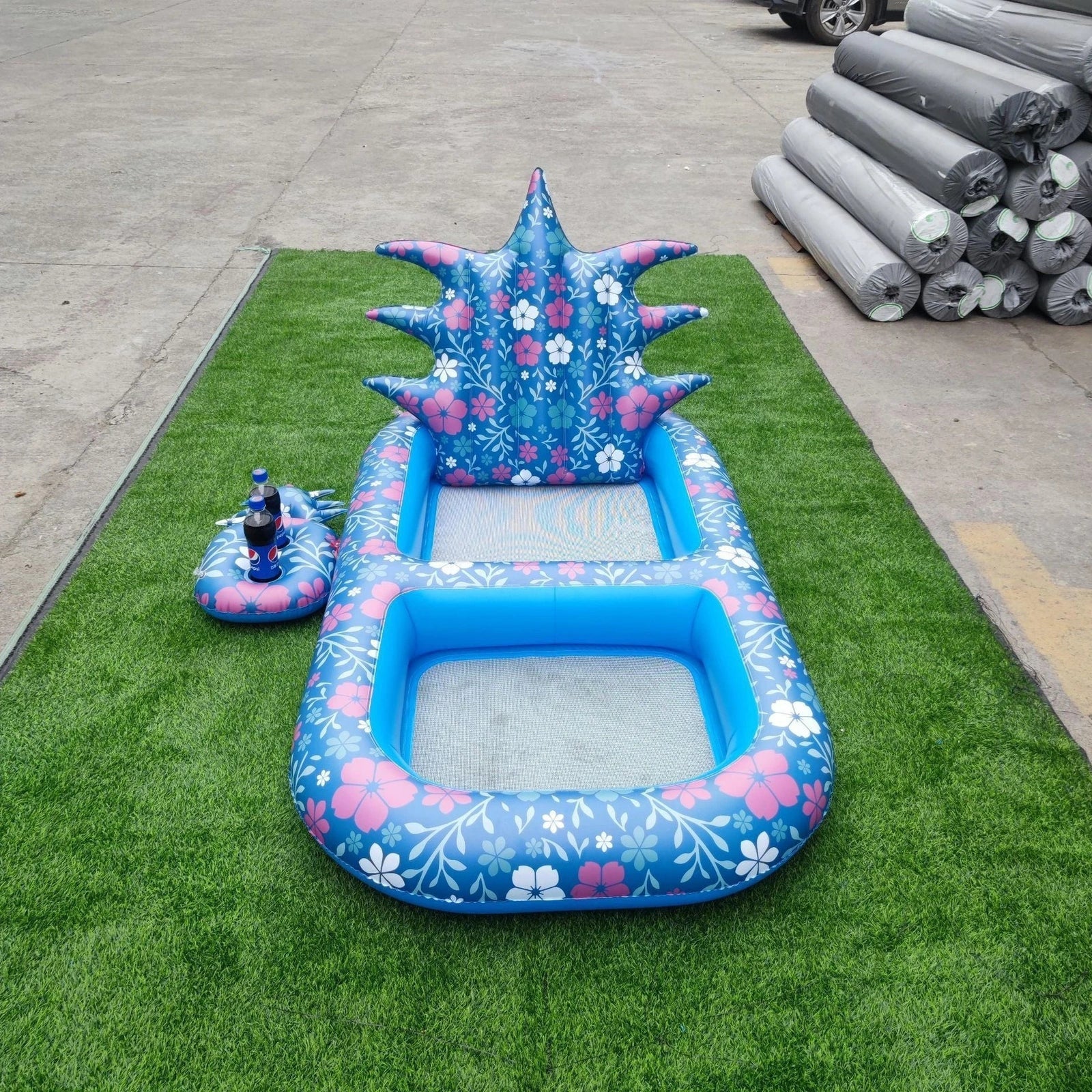 Yellow pineapple-shaped inflatable pool float with drink holder and ergonomic headrest design