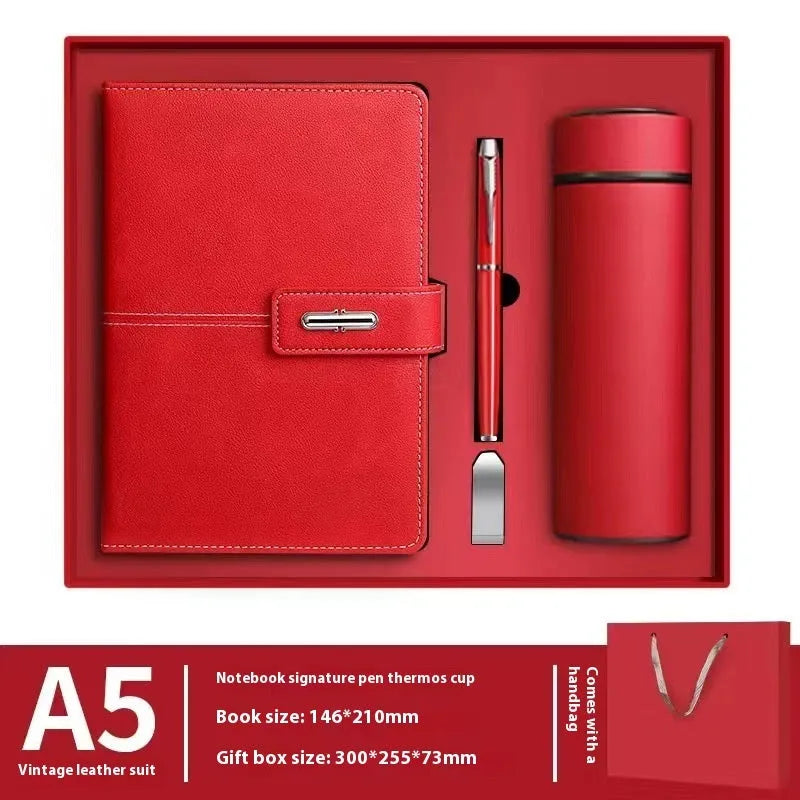 A5 notebook with imitation leather cover in a choice of colours including black, red, green, blue, and orange.