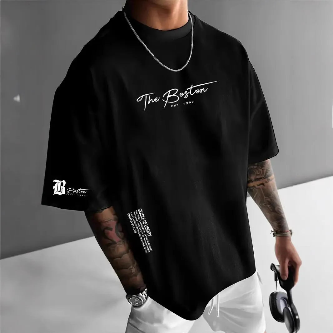 Men's round neck loose letter short sleeve T-shirt in polyester, shown in white, black, coral, and apricot