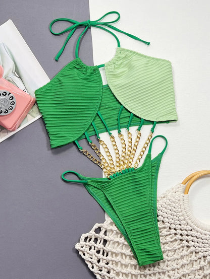Green women's hollow one-piece swimsuit with solid colour polyester fabric