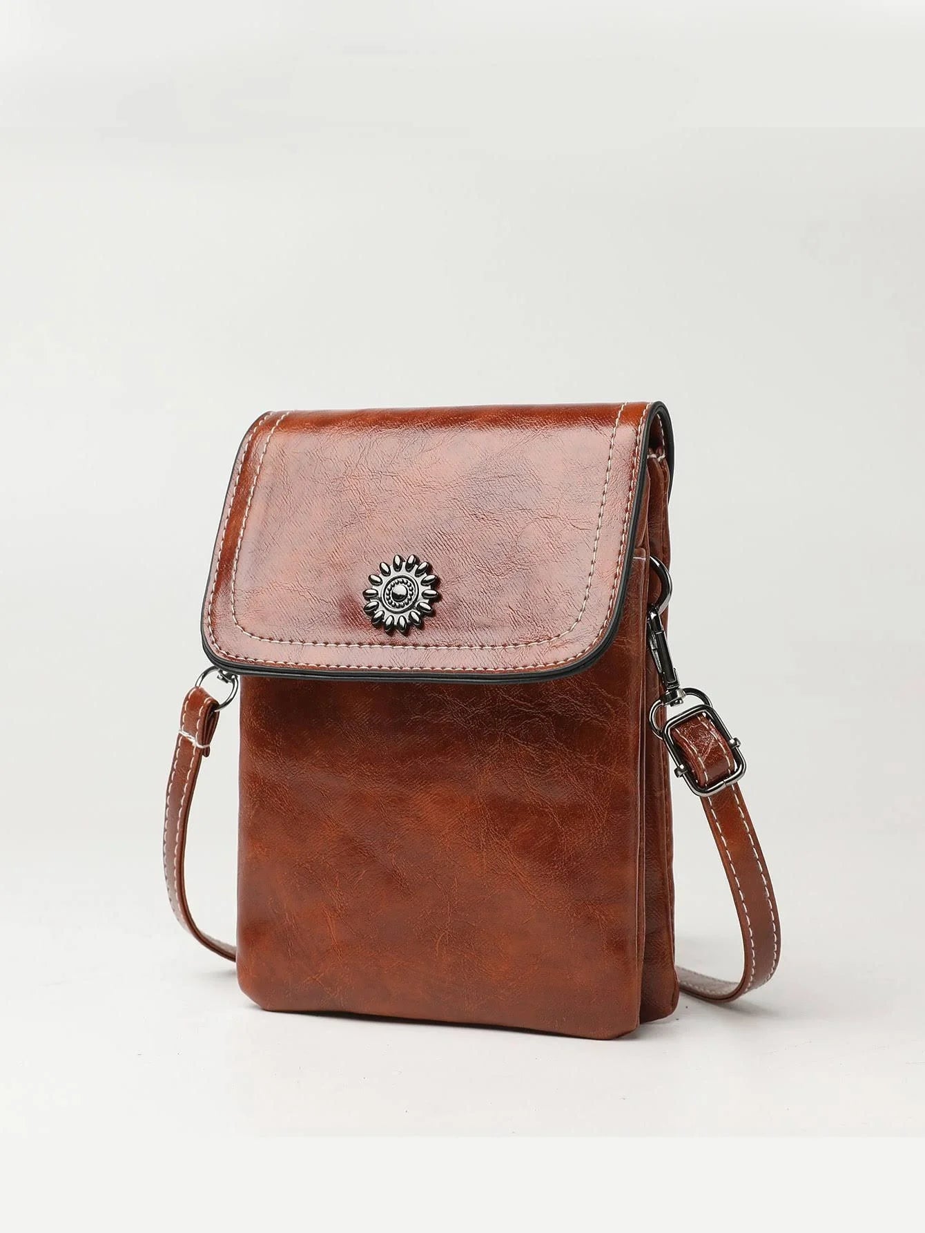 Stylish crossbody bag with mobile phone pocket, available in yellow, black, and brown colors