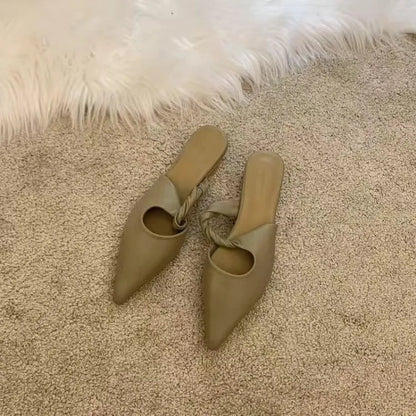Women's soft leather slippers with semi-toe box in black, khaki, cream-white, and dark brown colours on a rubber sole.