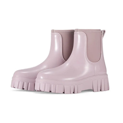 PVC low tube rain boots in apricot colour with non-slip sole and flat heel design