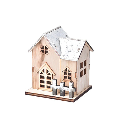 LED illuminated wooden Christmas cabin measuring 8cm by 7cm by 9.5cm with festive lighting