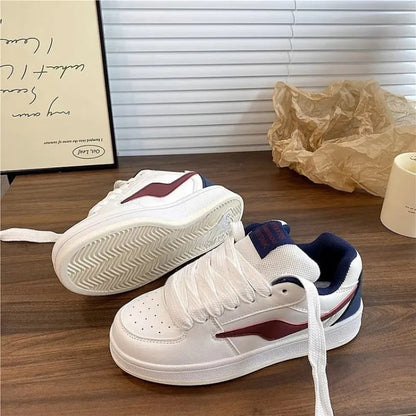 Women's low top board shoes in solid pink, white yellow, white black, or white red with mid heel and rubber sole