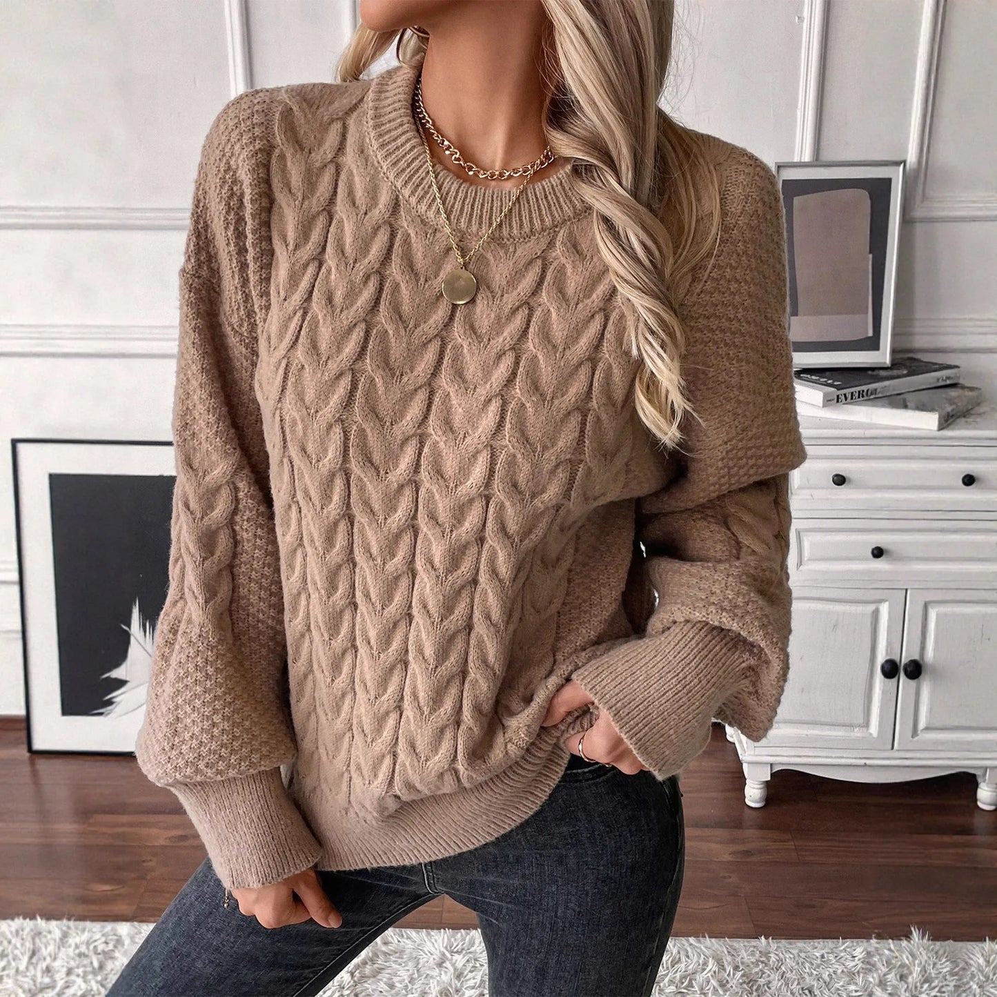 Women's round neck sweater with twist design in solid colour polyester fabric