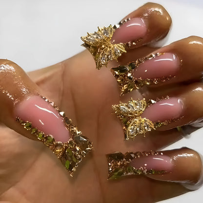 Golden Diamond In The Debris Butterfly patterned nail stickers and jelly glue tube.