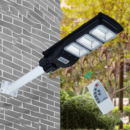 Integrated solar street light with LED illumination and solar panel, remote control operation