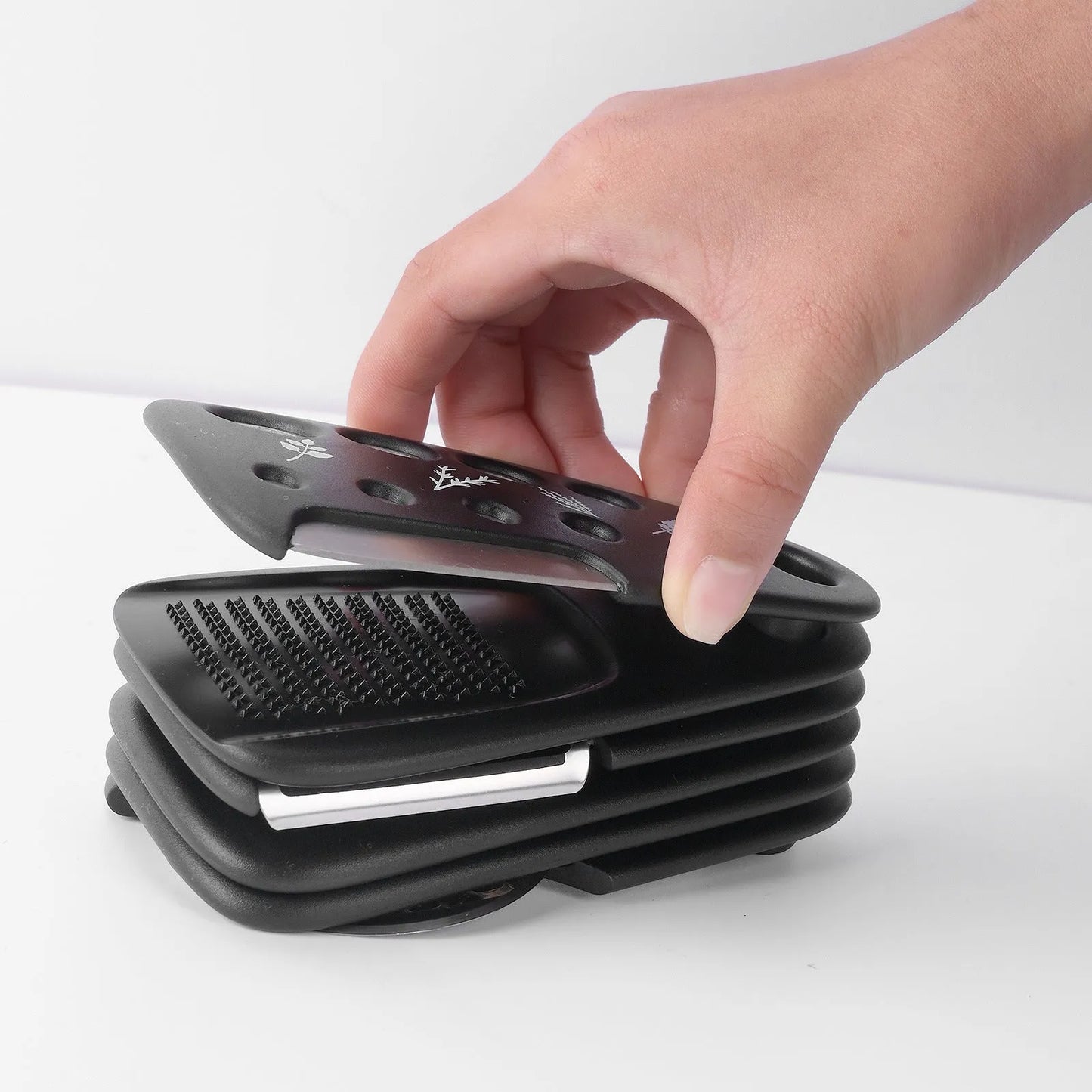 Six kitchen gadgets with cleaning brush in colour box storage unit