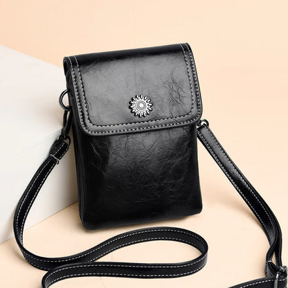 Stylish crossbody bag with mobile phone pocket, available in yellow, black, and brown colors