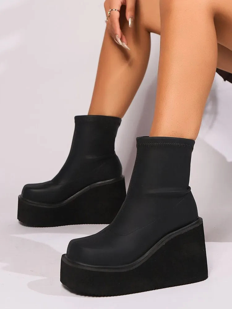 Plus size fashion boots with wedge heel and waterproof platform sole for women, available in black leather or suede-look PU with high or short tube sock lengths, sizes 35-43
