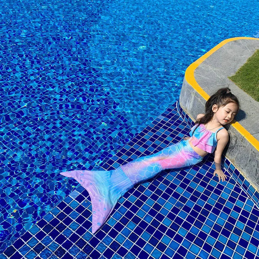Children's swimsuit set with bikini top and fish tail skirt in pink colours