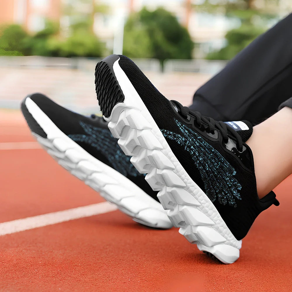 Women's black running sneakers with MD soles and cross strap detailing for jogging