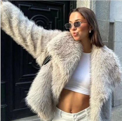 A warm and stylish plush coat for women, available in a variety of colors and sizes.