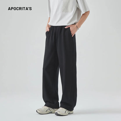 Men's grey cotton blend summer casual trousers with a high waist, straight leg, and front lace-up detail.