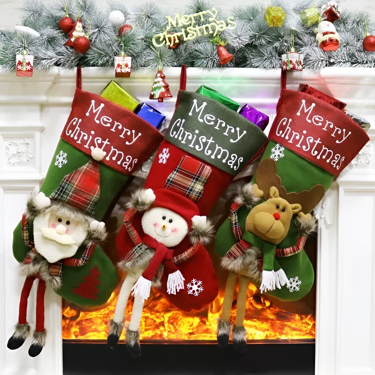 Set of three large red, white, and brown Christmas stockings with 3D Santa, Snowman, and Reindeer designs hanging on a tree.