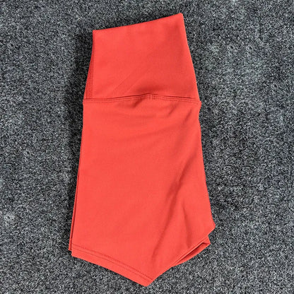 High-waisted yoga shorts in nylon fabric for moisture-wicking during sports, available in multiple colours and sizes.