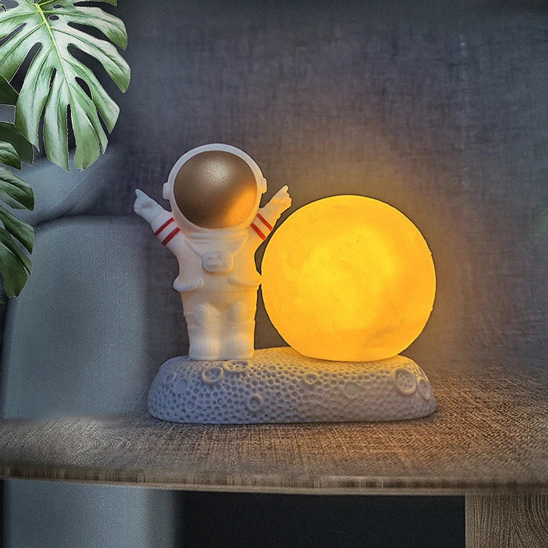 Modern astronaut night lamp with color-changing LED and detachable design